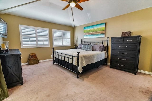 carpeted bedroom featuring ceiling fan and lofted ceiling