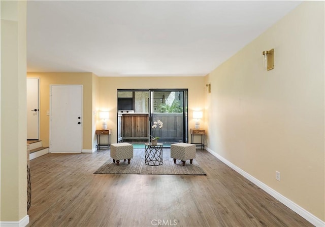 unfurnished room featuring wood-type flooring