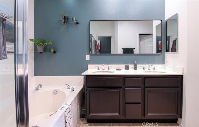 bathroom with separate shower and tub and vanity