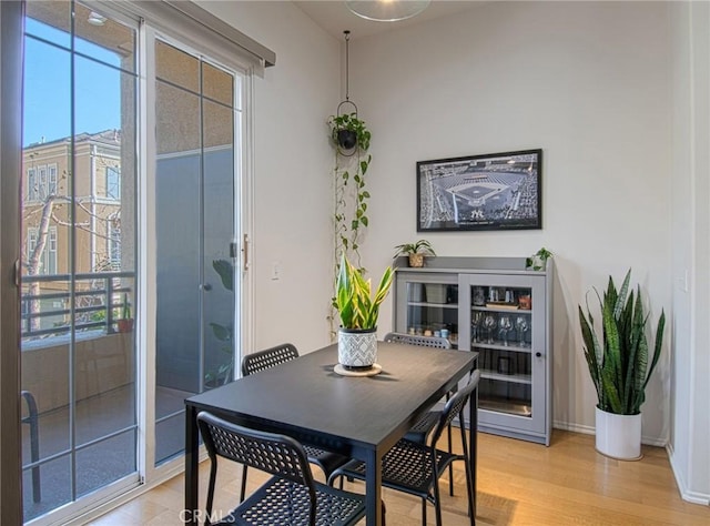 dining space featuring light hardwood / wood-style floors