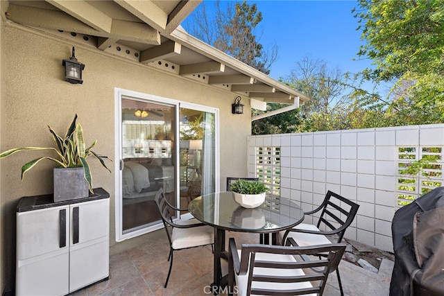 view of patio featuring a grill