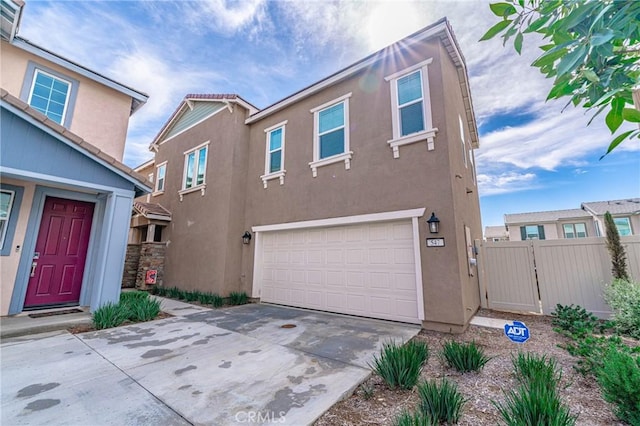 multi unit property featuring a garage