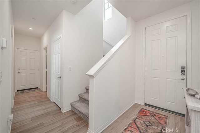 entryway with light wood-type flooring