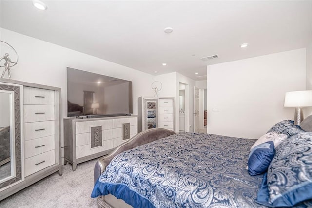 carpeted bedroom featuring a closet