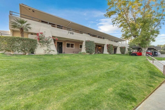 view of front of property with a front lawn