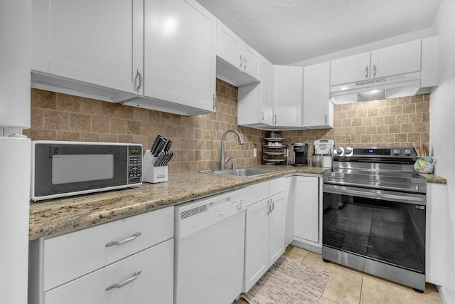 kitchen featuring white cabinets, stainless steel electric range, and white dishwasher