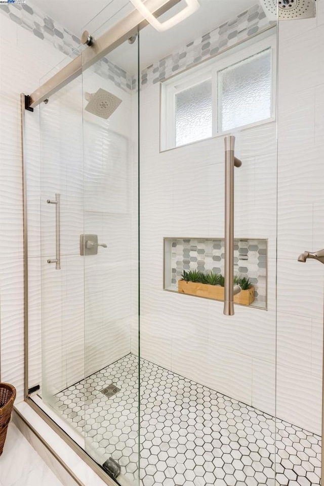 bathroom featuring walk in shower