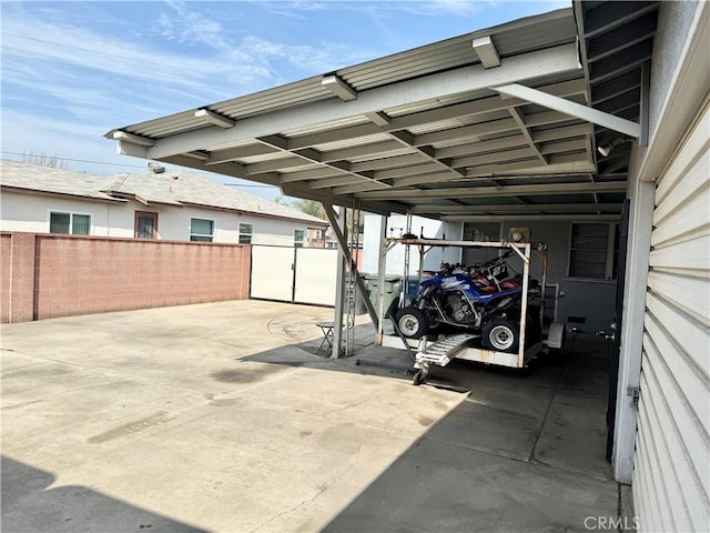 exterior space with a carport