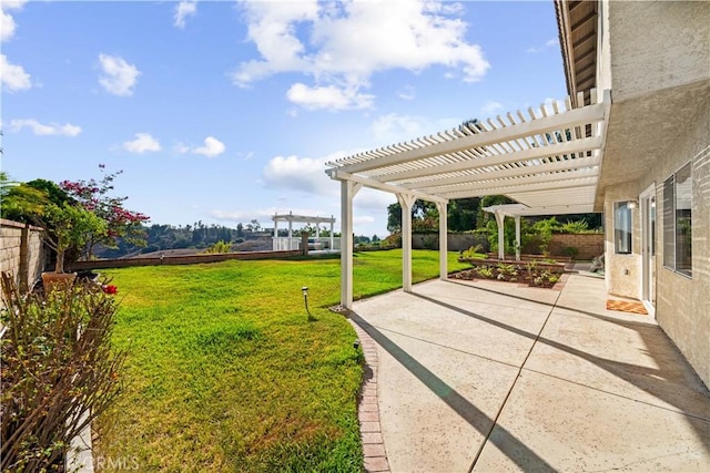 view of yard featuring a pergola and a patio area