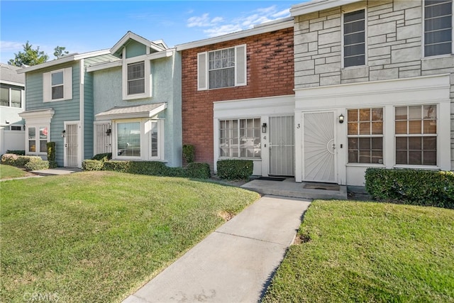 view of property with a front yard