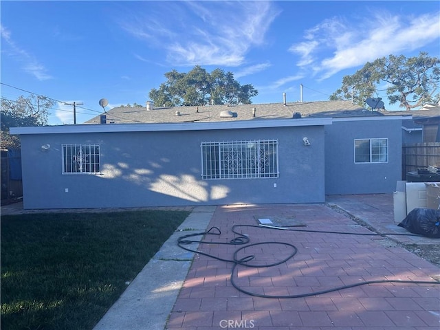 back of house featuring a patio area