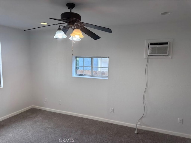 carpeted empty room with ceiling fan and an AC wall unit