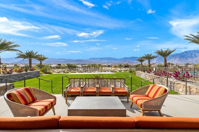 view of patio featuring a mountain view and outdoor lounge area