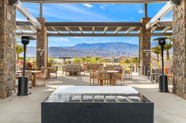 view of patio / terrace with a mountain view