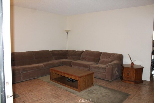 living room with parquet flooring