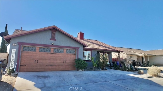 single story home featuring a garage