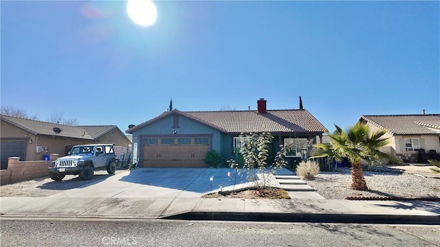11807 Lupin Rd, Adelanto, CA 92301 - single story home featuring a tile roof, a chimney, an attached garage, stucco siding, and concrete driveway