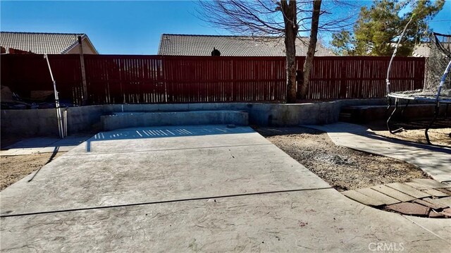 view of patio with a trampoline