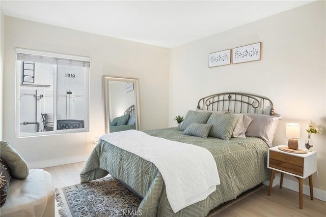 bedroom featuring hardwood / wood-style floors