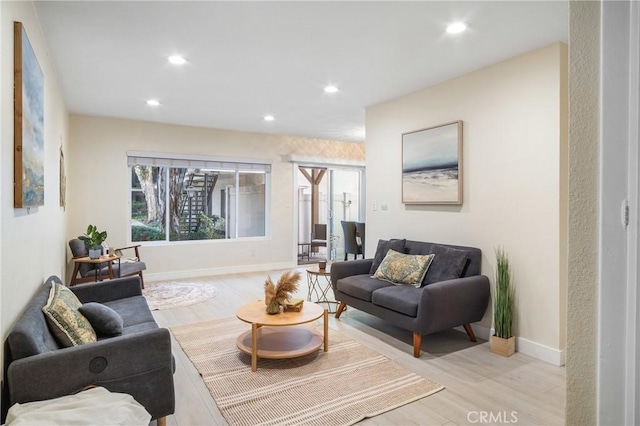 living room featuring light wood-type flooring