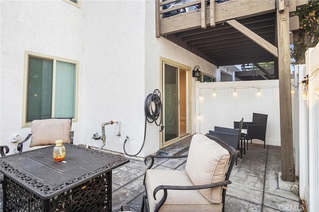 view of patio / terrace with a balcony