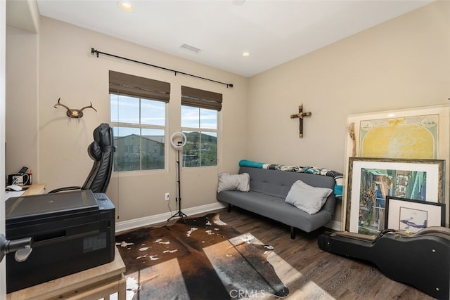 interior space with recessed lighting, wood finished floors, visible vents, and baseboards