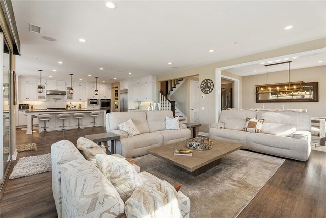 living room with dark hardwood / wood-style floors