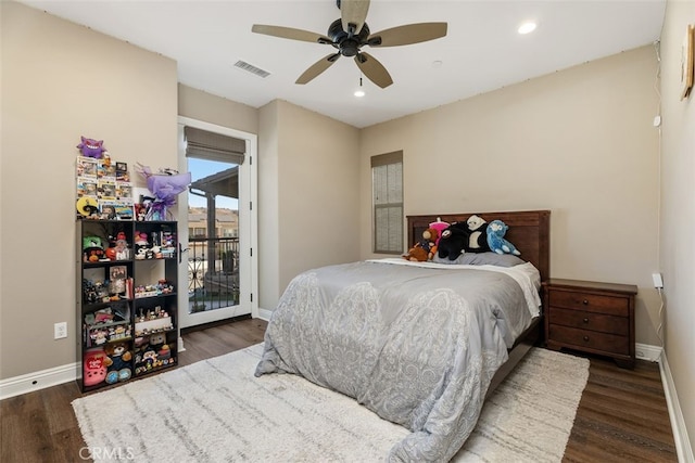 bedroom with dark hardwood / wood-style floors, access to outside, and ceiling fan