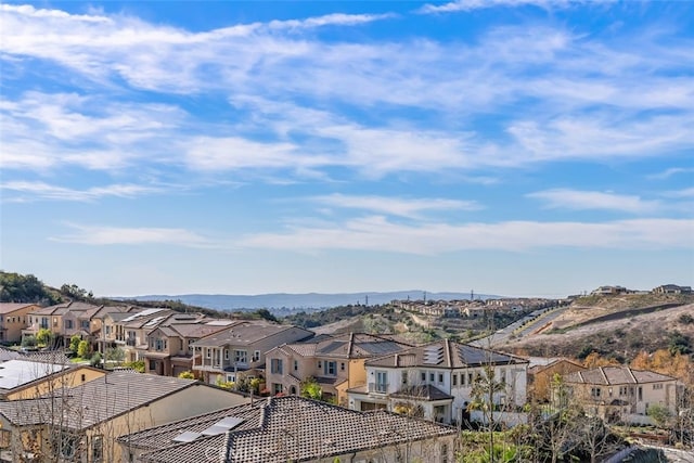 property view of mountains with a residential view