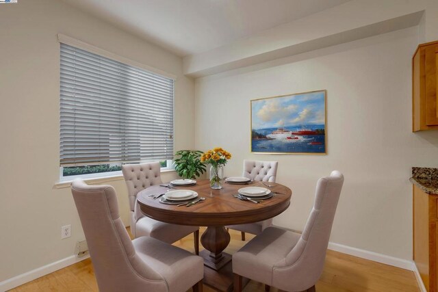 dining room featuring light hardwood / wood-style flooring