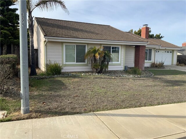 single story home with a garage