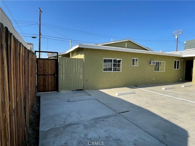 rear view of house featuring a patio area