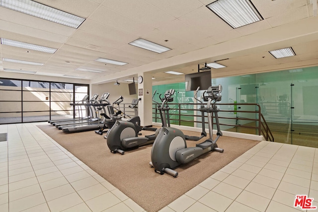 exercise room with carpet flooring