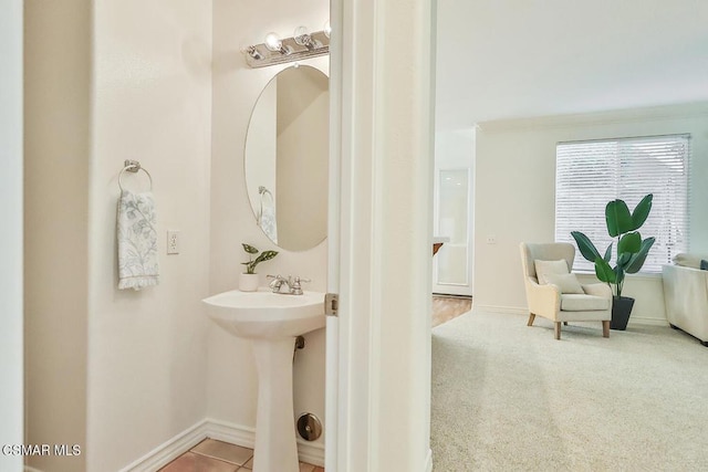 bathroom with tile patterned floors