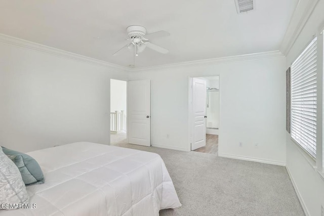 carpeted bedroom featuring ceiling fan, multiple windows, and crown molding