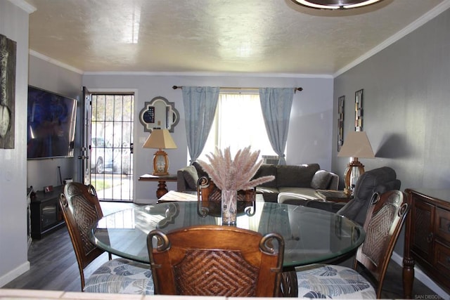 living room featuring hardwood / wood-style flooring and ornamental molding