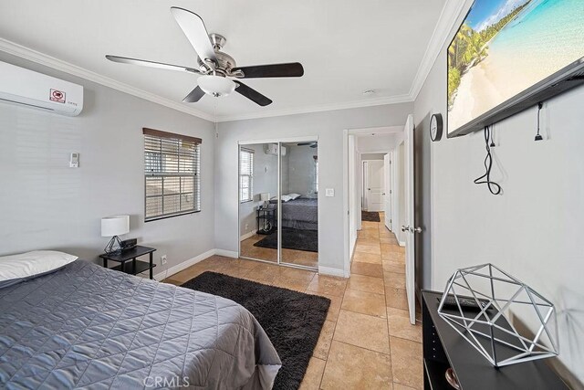 bedroom featuring ceiling fan, a wall mounted air conditioner, a closet, light tile patterned flooring, and crown molding