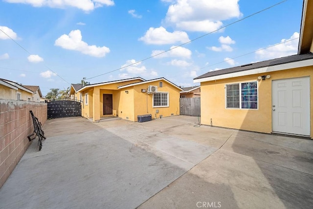 back of property featuring a patio area