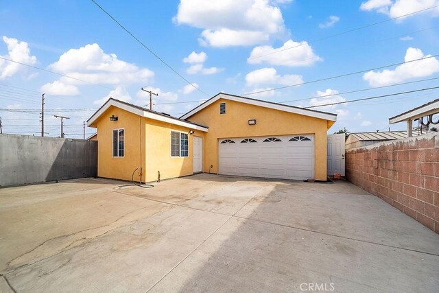 exterior space with a garage