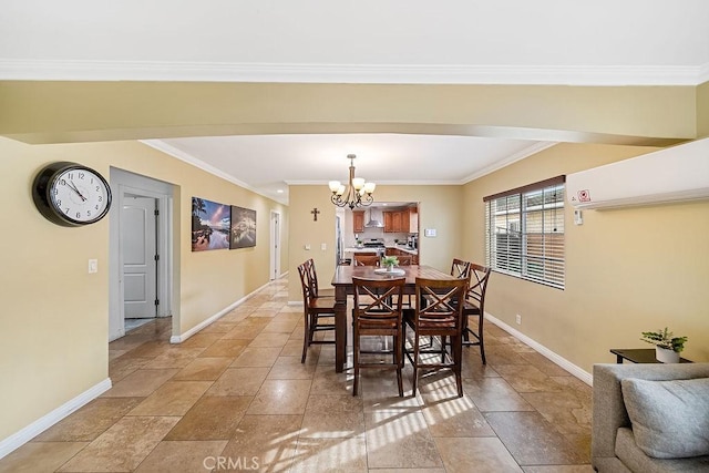 dining area with ornamental molding and a chandelier