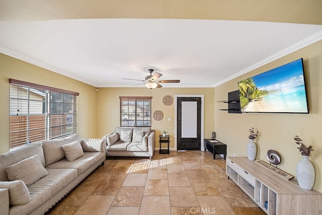 living room with ceiling fan and crown molding