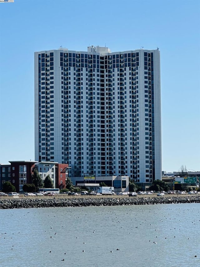 view of property with a water view