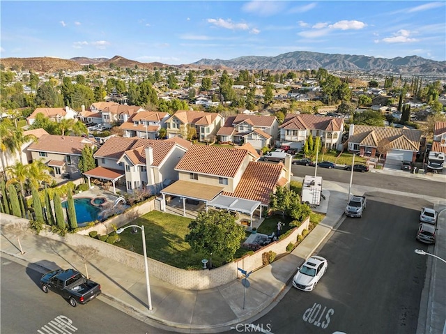 bird's eye view with a mountain view