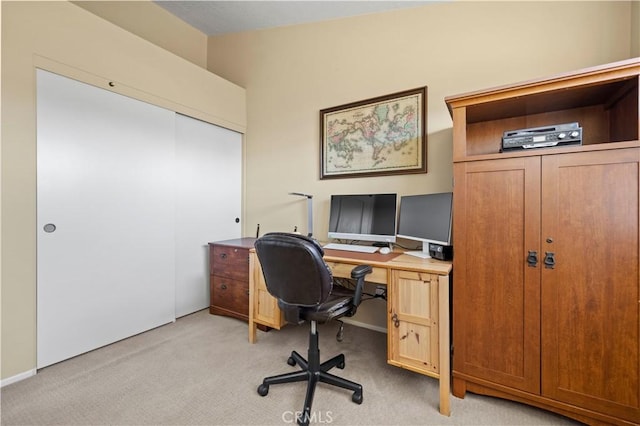 home office with light carpet