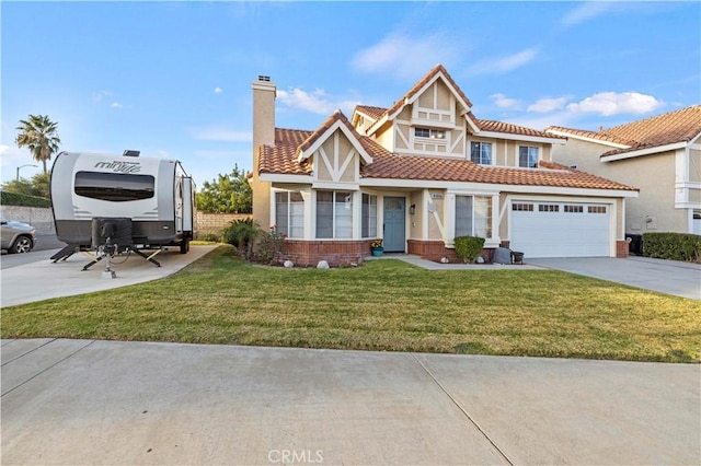 view of front facade featuring a front lawn and a garage