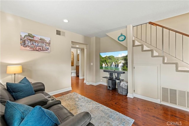 living room featuring dark hardwood / wood-style floors