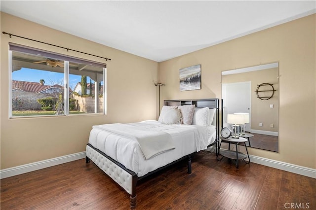 bedroom featuring dark wood-type flooring