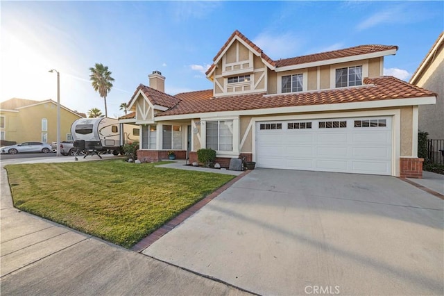 view of front facade featuring a garage and a front lawn