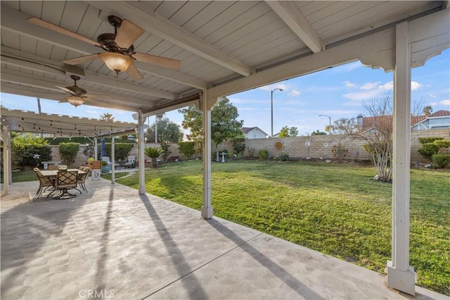 view of patio / terrace featuring ceiling fan and a pergola