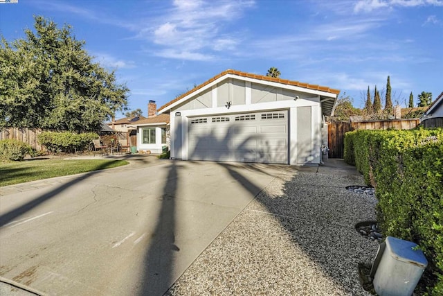 ranch-style house featuring a garage